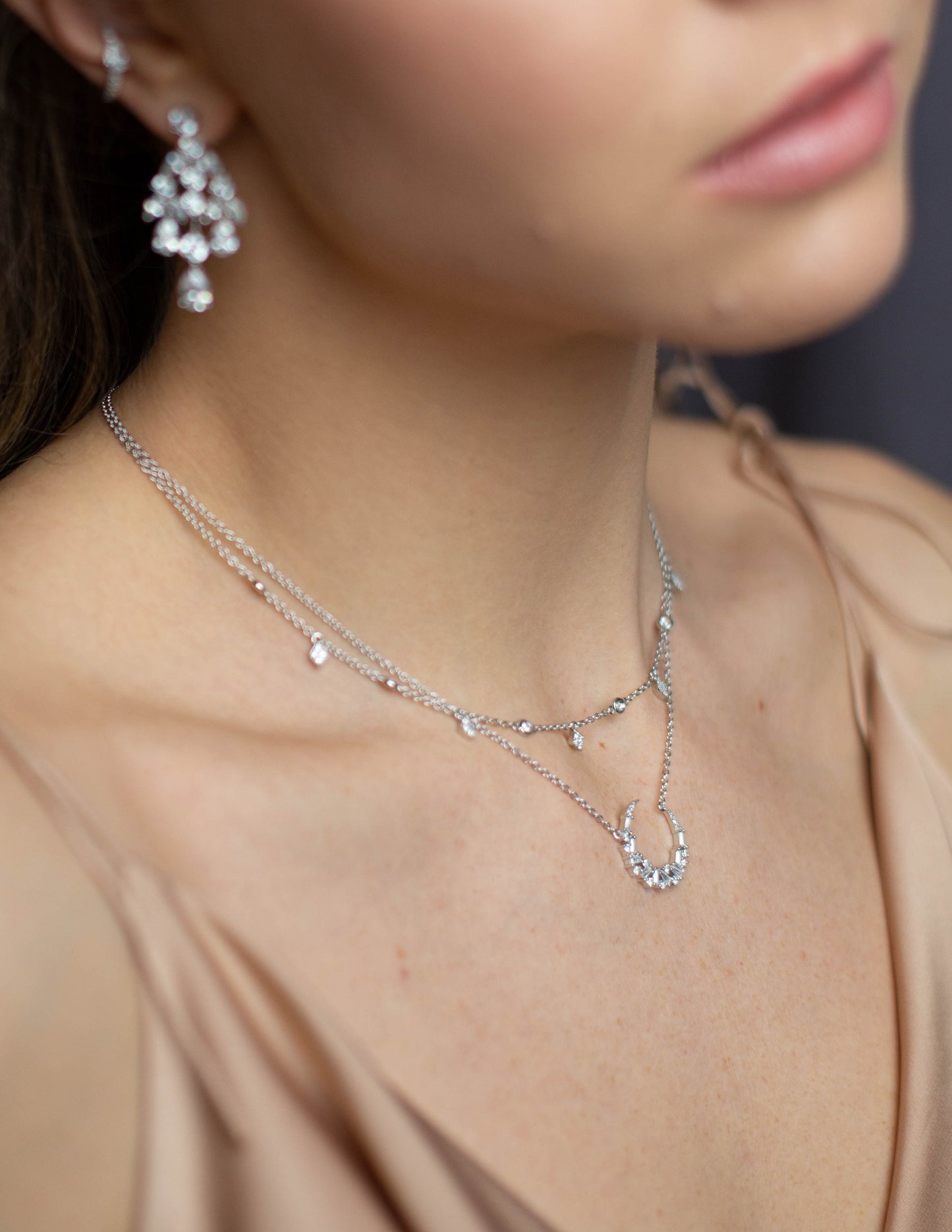 Silver necklace with round and rhomboid pendants